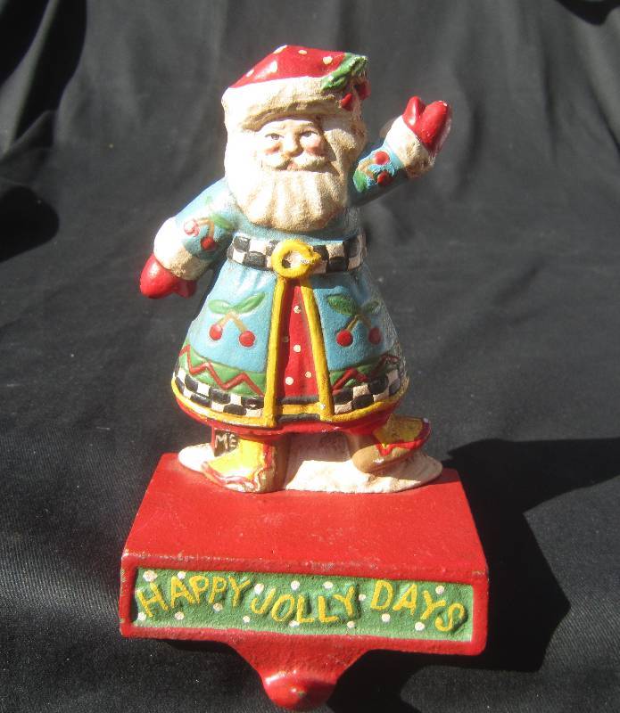 lot 531 image: Cast Iron Santa Happy Jolly Days Stocking Holder