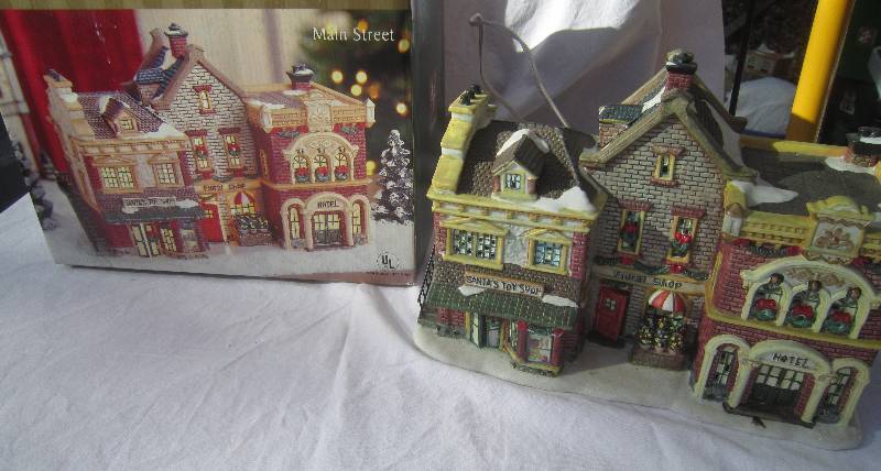 lot 553 image: Collectible Christmas Lighted House with Box - Village Square - Main Street