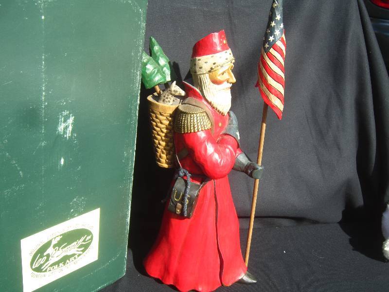 lot 606 image: Leo Smith Folk Art Stars and Stripes Santa