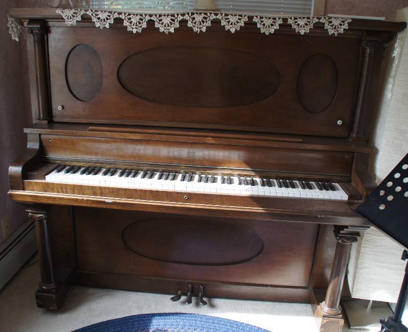 lot 778 image: Upright Antique Piano Works great Been Refurbished