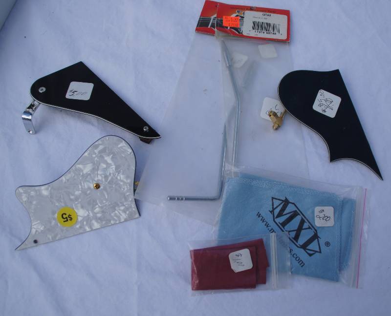lot 785 image: Lot of Music items Pick Guards Cloths for Cleaning, Whammy Bars
