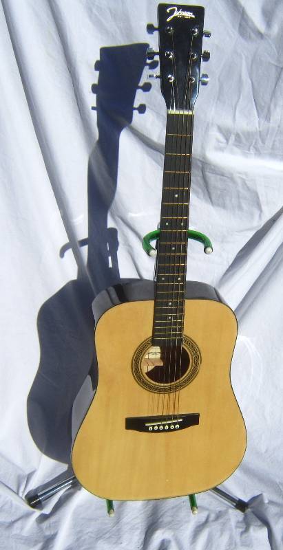 lot 627 image: Johnson Acoustic Guitar