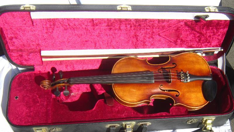 lot 632 image: 44 Fretschner Handmade German Violin with Hand Painted Oblong Case, Shoulder Rest, and Bow.