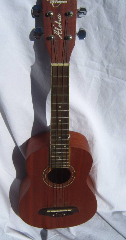 lot 633 image: Oscar Schmidt Aloha Ukulele.