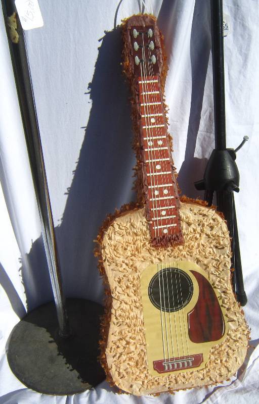 lot 655 image: Two Microphone Stand Parts w Guitar Pinata