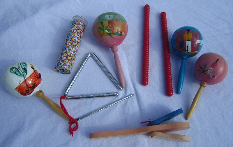 lot 664 image: (4) Maracas, Triangle, Red Rhythm Sticks.