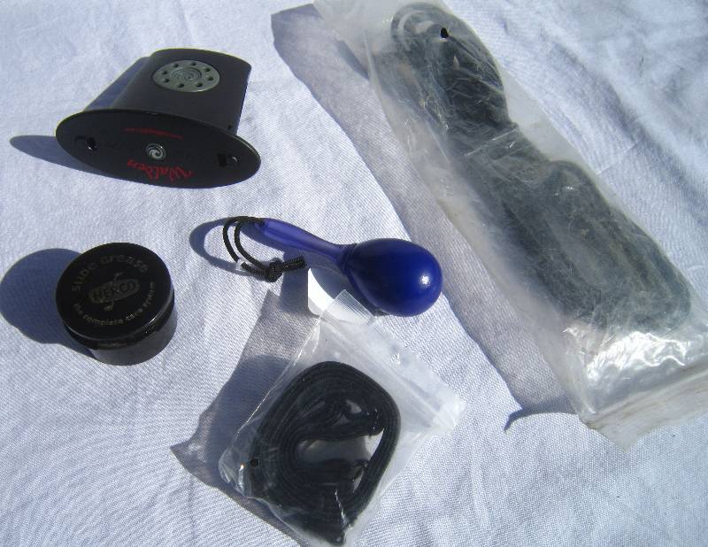 lot 668 image: Guitar Humidifier, Maraca, Slide Grease, Electric Guitar Chord