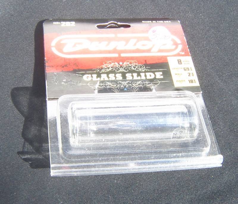 lot 702 image: Dunlop Glass Guitar Slide.