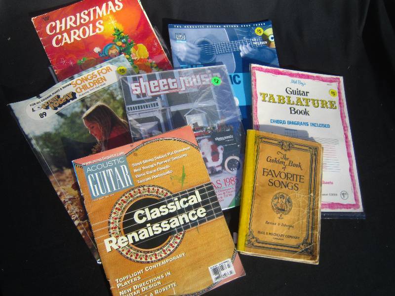 lot 736 image: Acoustic Guitar Magazines and lot of Music Books.