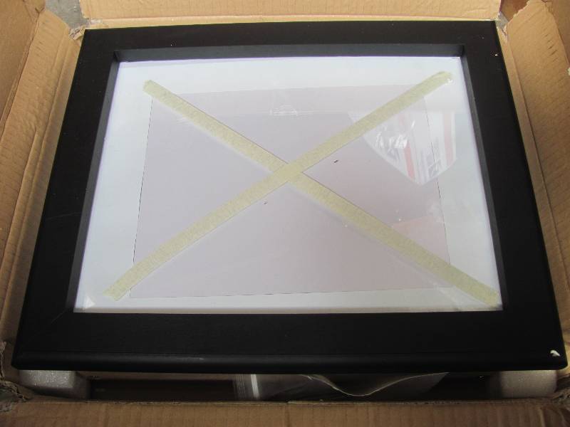 lot 42 image: Hide-A-Gun Picture Frame