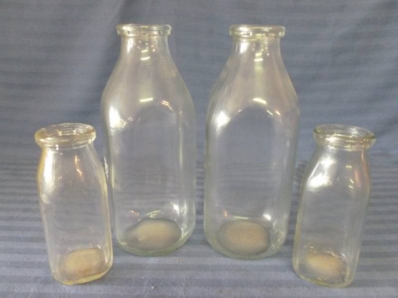 lot 31 image: Vintage Milk Bottles