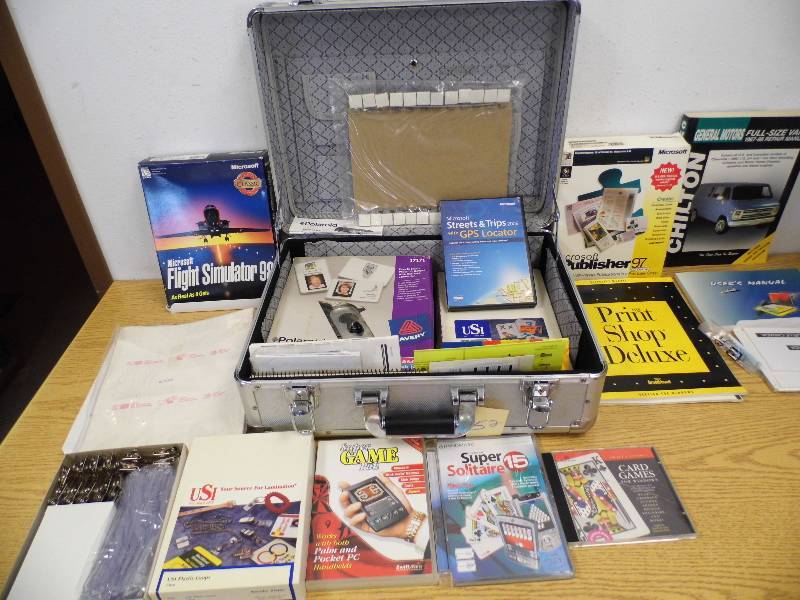 lot 52 image: Case with Programs, camera and manuals