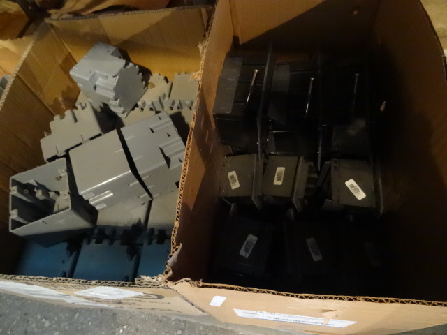 Shelf of Plastic Boxes