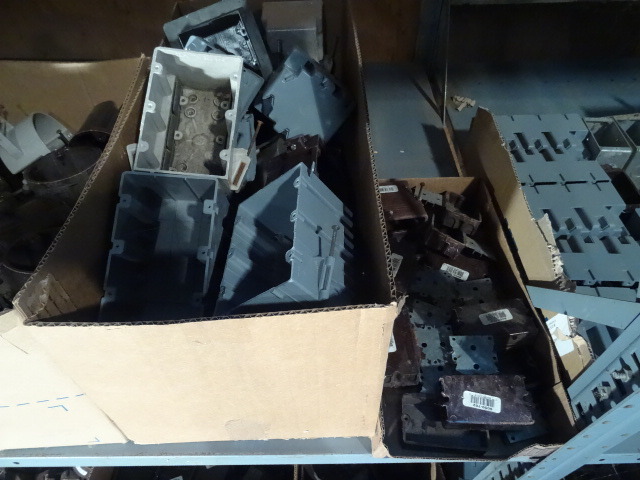 Shelf of Plastic Boxes