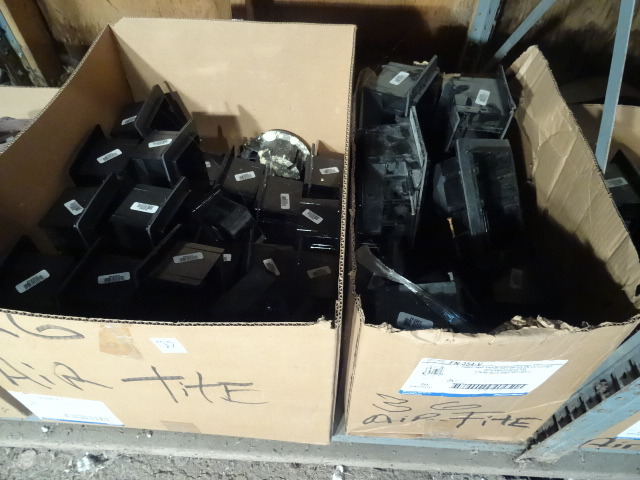 Shelf of Plastic Boxes