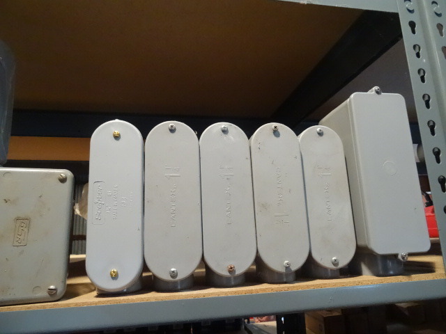 Shelf of PVC LBs and Metal J. Boxes