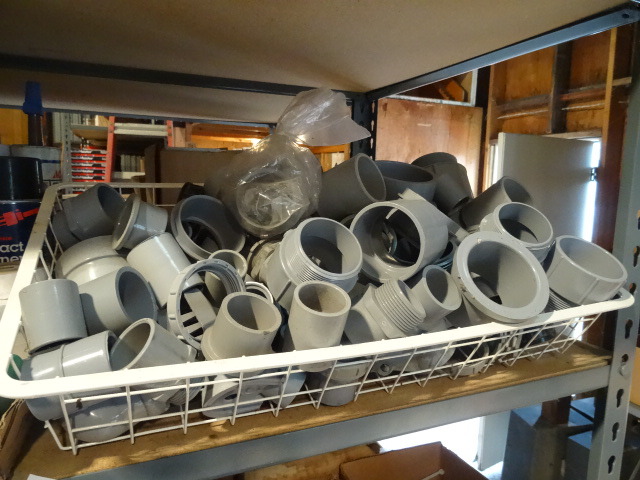 Shelf of PVC Fittings, Tape Etc.