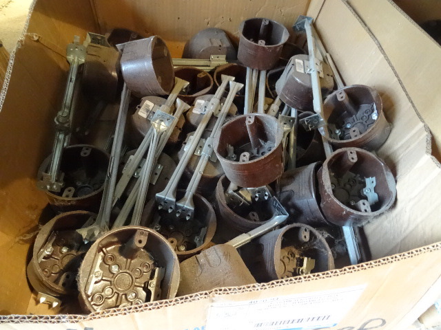 Shelf of Plastic Bar Hanger Boxes