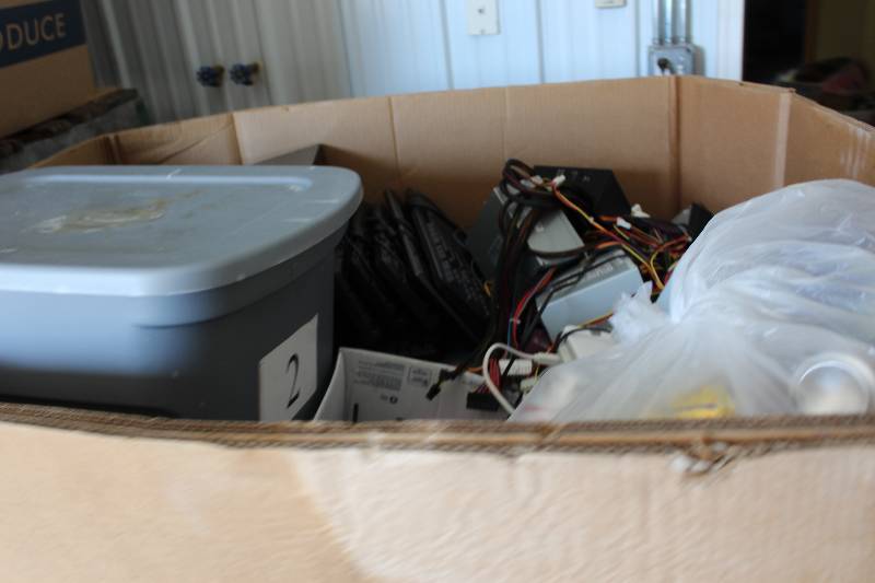 lot 9 image: Gaylord Box Lot of Used Electronics Including Keyboards wCords, Tote of VHS Tapes, Desktop Power Supplies, And More 488lbs Total Weight.