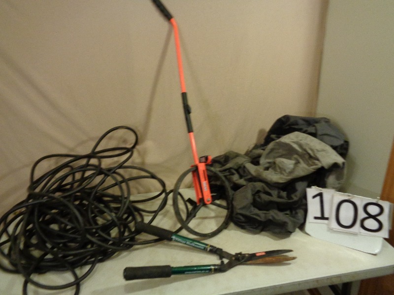 lot 108 image: Snowmobile Cover, Airhose, and More