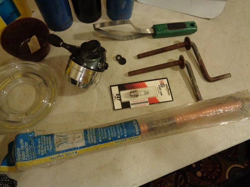 lot 123 image: Torches, Rain Pants, and More