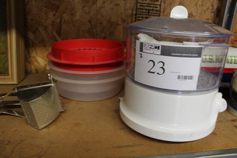 lot 23 image: Lot of (3) Including Tupperware, Strainer Sun Beam Food Steamer Metal Cheese Grater.