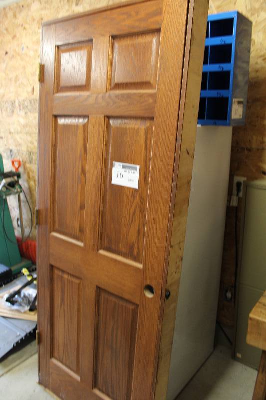 lot 16 image: Wooden Door wGrid Panel 33 x 4.5 x 82.