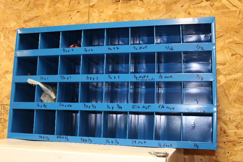 lot 17 image: Storage Shelf wDivided Compartments 34 x 8.5 x 19.5.  Includes Contents.