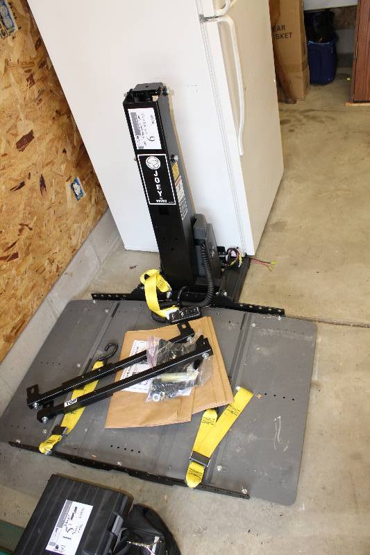 lot 6 image: Bruno Handicap Scooter Lift Serial No. 13050100415 Model # VSL-4000HW 44 x 42.5 x 37.  SRP  $3,000.00.