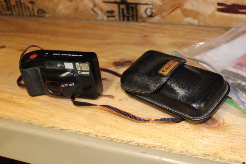 lot 52 image: Canon Top Shot Sure Shot Camera wFlash & Leather Case.
