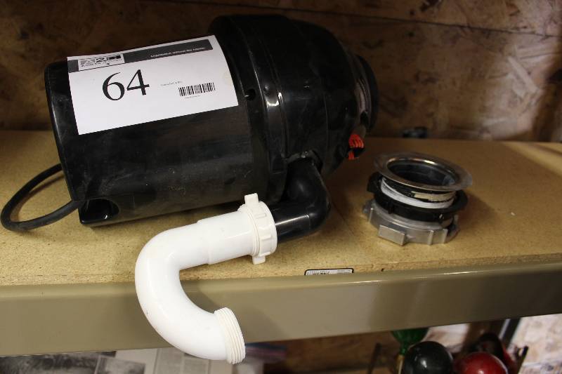 lot 64 image: G.E. Disposall Under Sink Garbage Disposal - New, never Installed.