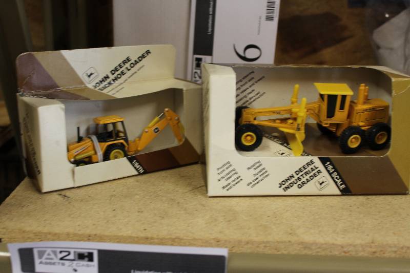lot 87 image: Lot of (2)Vintage Collectible John Deere 164 Scale Toy Tractors Industrial Grader & Back Hoe Loader.