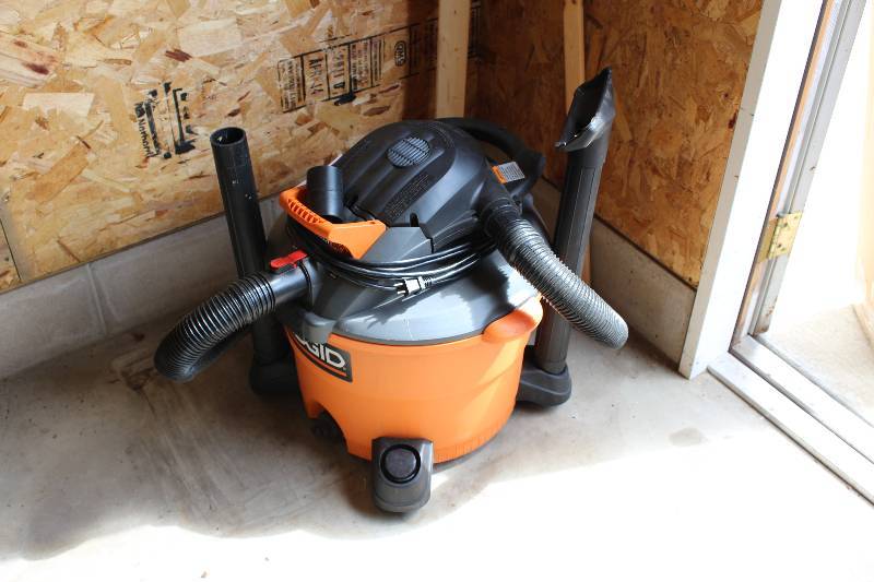lot 97 image: Rigid Vacuum Cleaner wCanister, Hoses, Cord & Attachments.