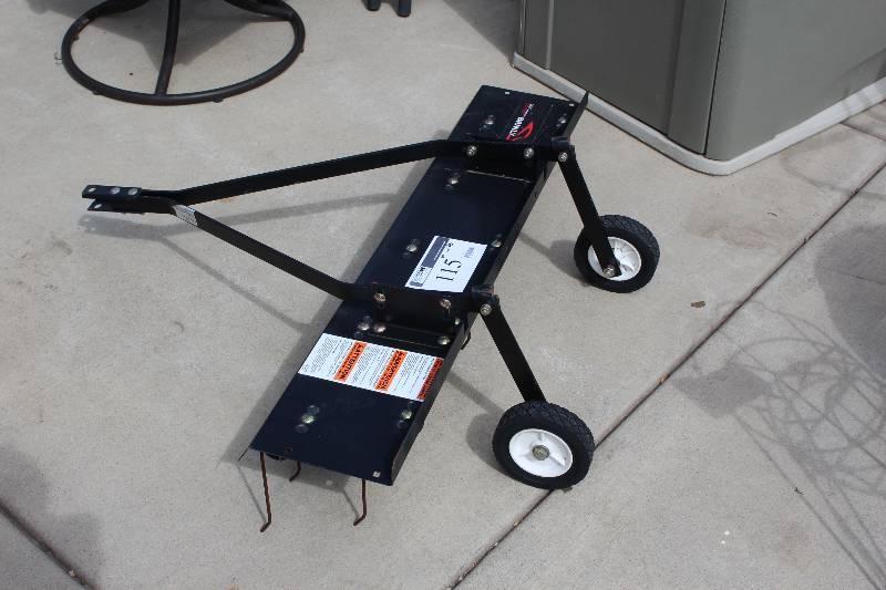 lot 115 image: Brinly Hardy Pull Brake wArm & Wheels DT-401BH 41 Width.