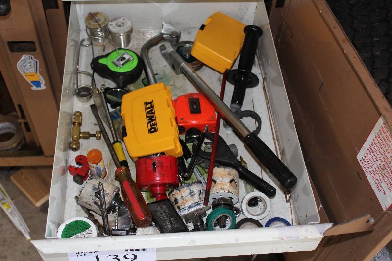 lot 139 image: Drawer Lot Including Measuring Tape Fire Starter Drill Bits Screw Drivers And More.