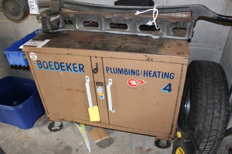 lot 140 image: Metal Cabinet wDouble Doors & Wheels Does Not Include Contents 25 x 46 x 38.
