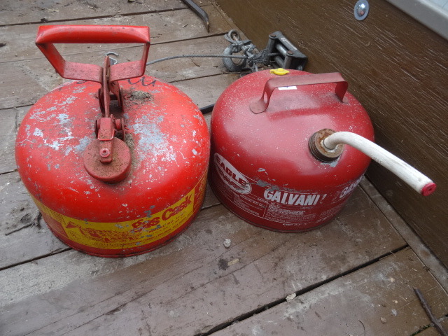 2 Metal Gas Cans. 2 12 Gal.