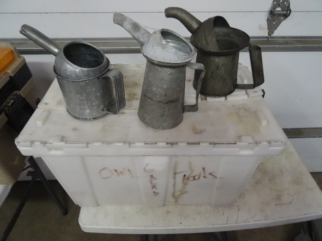 3 Galvanized Oil Cans. Plastic Tote