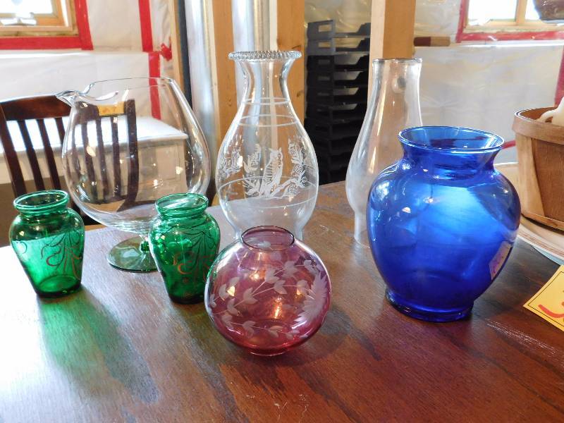 lot of red blue green and clear glass vases