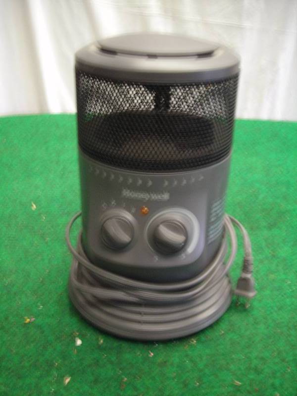 lot 38 image: Honeywell Electric Surround Heater