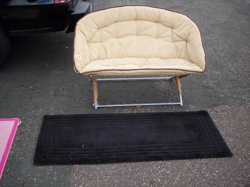 lot 44 image: Folding 48 Inch Love Seat, Black Rug 25x61