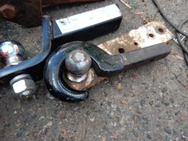 lot 22 image: Various Trailer Hitches, balls.. Hook with 1 14 in receiverr.
