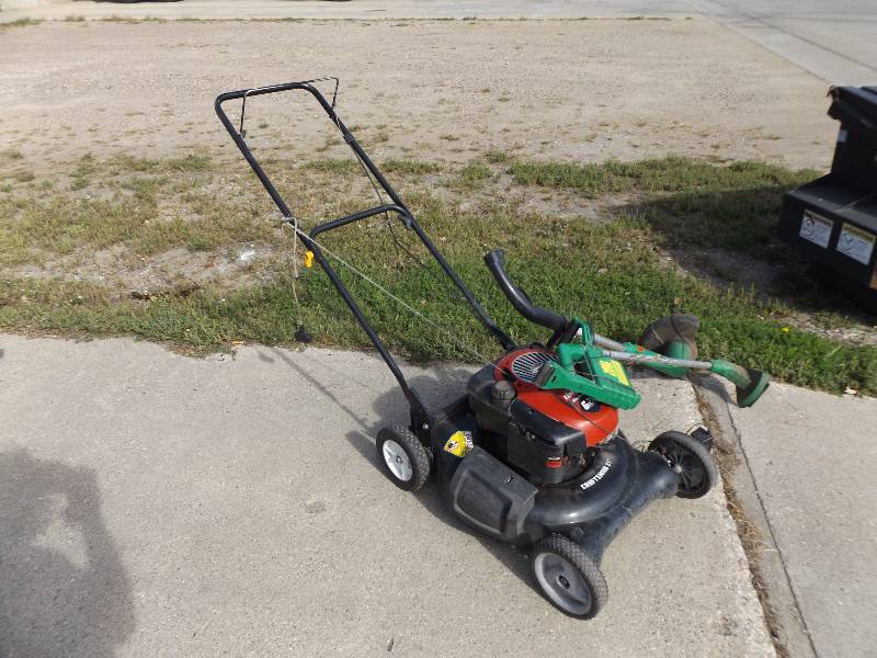 lot 238 image: Sears Push Lawnmower and Two weed wackers