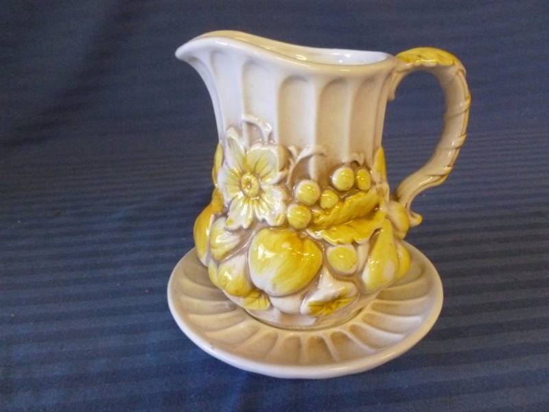 lot 58 image: Decorative Pitcher Set