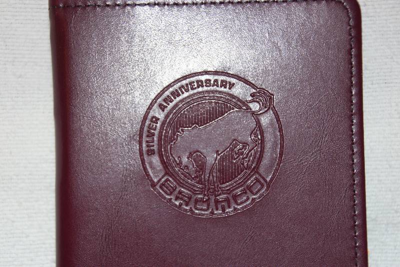 lot 14 image: 1991 Ford Bronco Silver Anniversary Glovebox Wallet