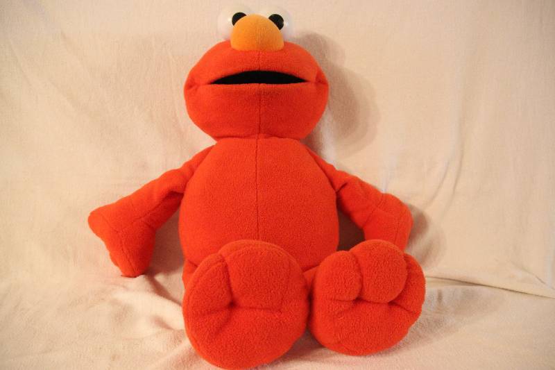 lot 18 image: Fisher Price - Elmo Stuffed Toy
