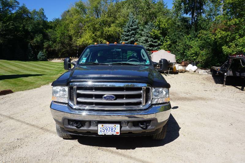 lot 1 image: 2004 Ford F-350 Lariat Super Duty Extended Cab 4 x 4 Pick Up