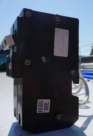lot 23 image: GE Brand 60 amp GFI Circuit Breaker
