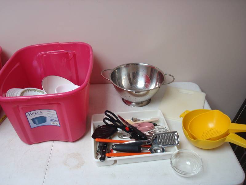 Pink Bin With Some Kitchen Items
