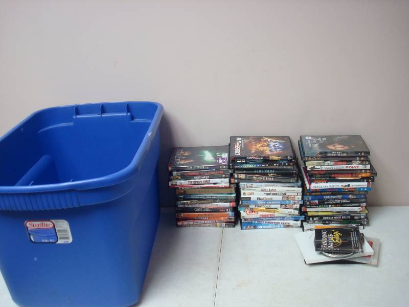 Bin With A Bunch Of DVDs May Show Wear
